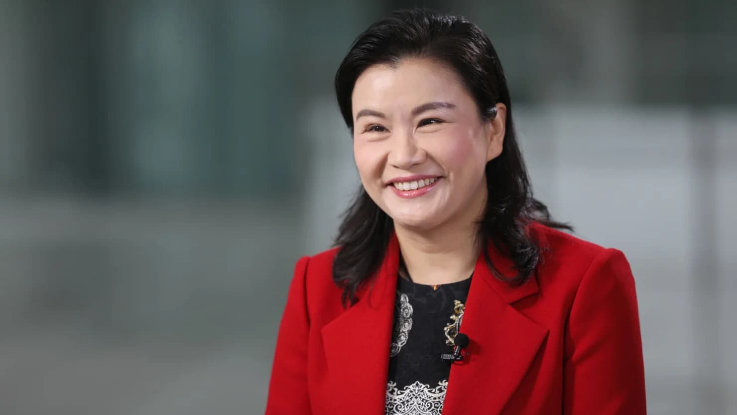 From Worker to Tech Mogul: Zhou Qunfei’s Journey